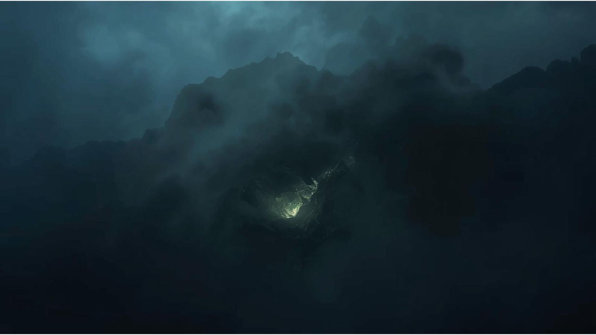 Misty peak silhouetted against a slate sky
