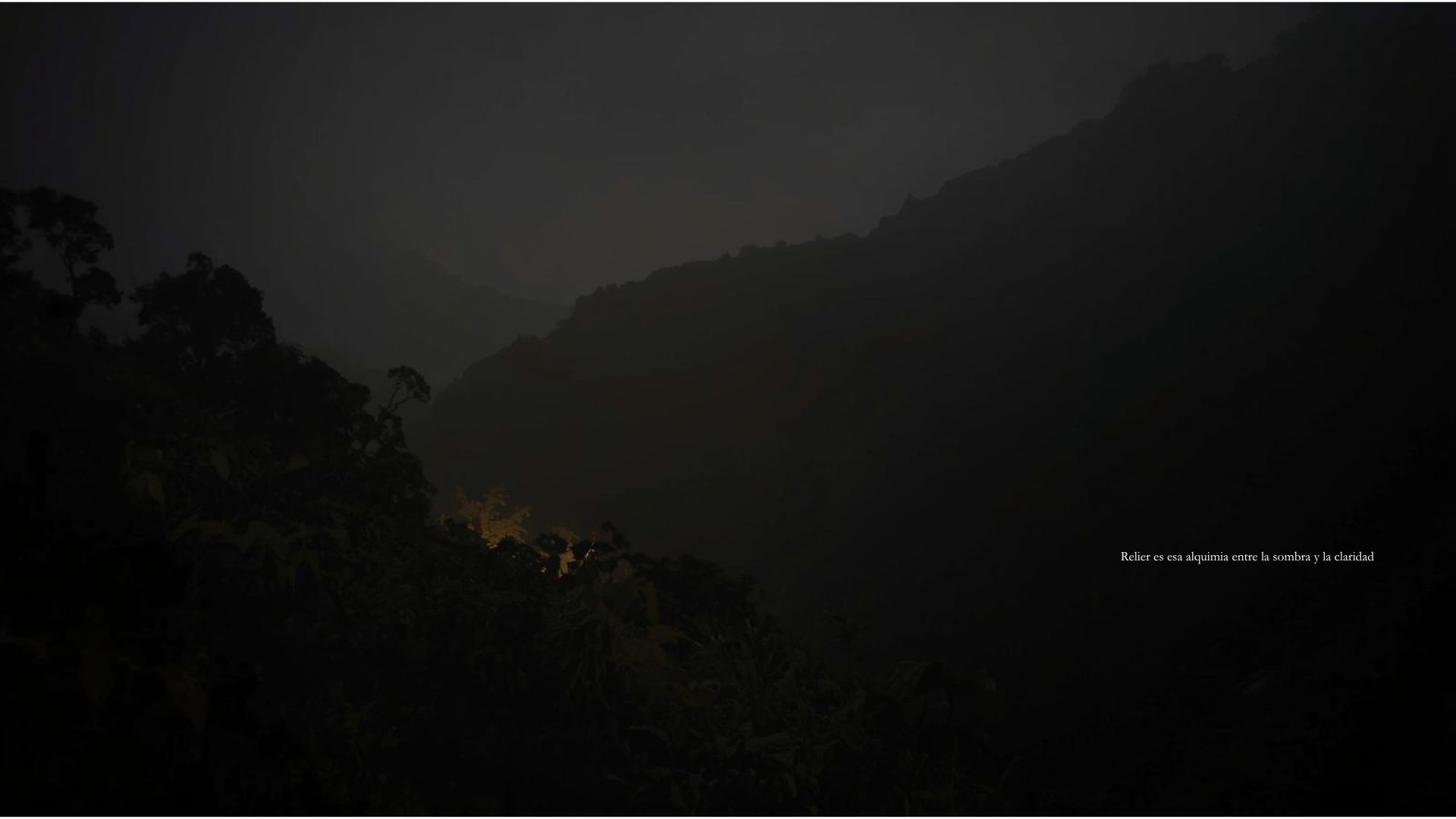 A dim ridge at dusk: the meeting of shadow and the last clarity.